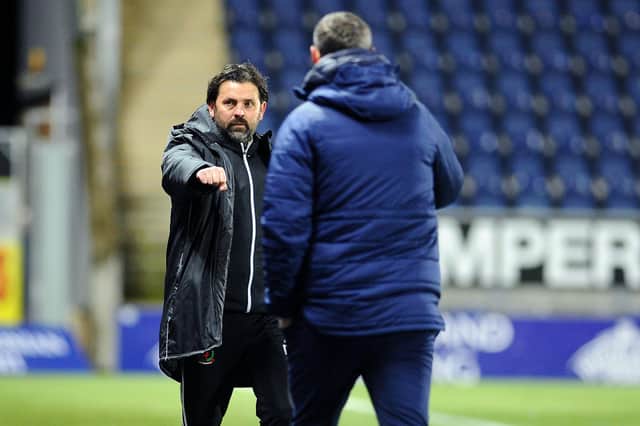 Paul Hartley did acknowledge David McCracken after the match in November but did not shake hands (fist bump) Lee Miller and did the same this afternoon
