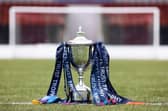 The SPFL Trust Trophy was present at Monday's draw in Airdrie (Photo: Alan Harvey/SNS)