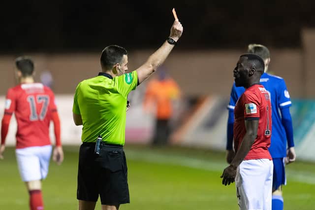 Morgaro Gomis is sent off in the second half after reviving a second yellow card for simulation (Pics: Ian Sneddon)