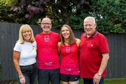 Jim McLelland and wife Gillian, centre, will be running the London Marathon supported by Andrew Niven and his wife Gillian