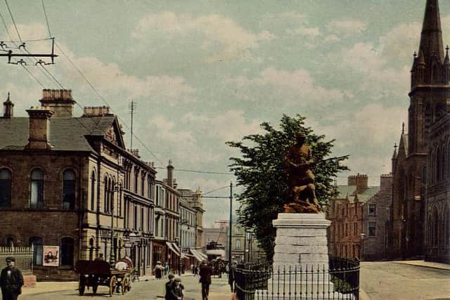 Looking east along Newmarket Street after the arrival of the trams in 1905 and the South African War Memorial the following year