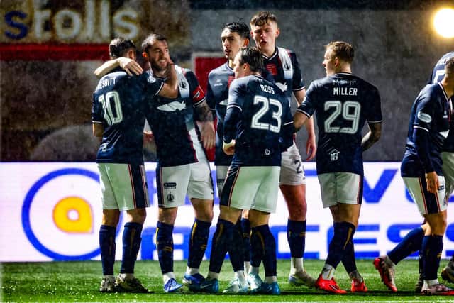 HAMILTON, SCOTLAND - OCTOBER 18: Falkirk’s Brad Spencer celebrates with teammates after his side go 1-0 ahead during a William Hill Championship match between Hamilton Academical and Falkirk at the ZLX Stadium, on October 18, 2024, in Hamilton, Scotland. (Photo by Ross MacDonald / SNS Group)