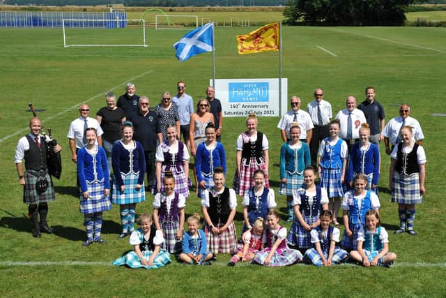 Piper Andy Gibbs, Airth Highland Games incumbent chieftain Robert Smith, president John McTaggart and committee members were joined by the Jenkins School of Highland Dancing for the ceremony. Picture: Michael Gillen.