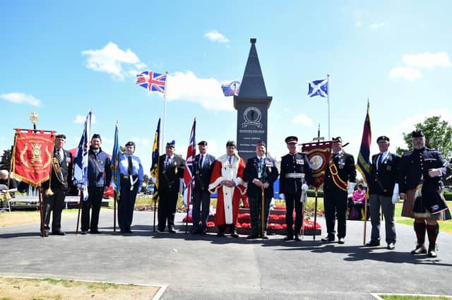Lord Lieutenant of Stirling and Falkirk Alan Simpson, Provost Robert Bissett and standard bearers at the dedication of Bainsford War Memorial