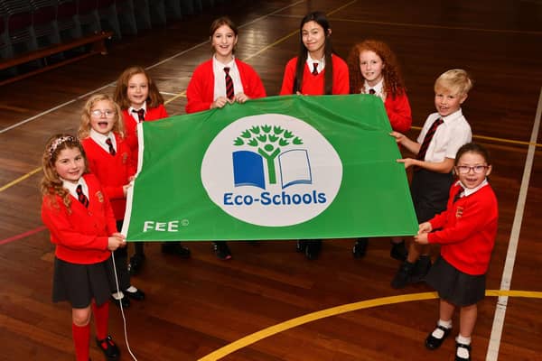 St Francis Xavier's eco group with the fourth Green Flag the primary school and nursery has been awarded. Pic: Michael Gillen