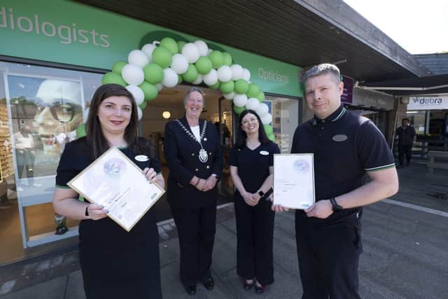 Kaitlin Nelson and Damian Kelly were presented with special recognition service awards