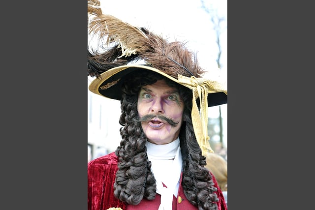 Captain Barbossa leads Pirates and Princesses Parade.