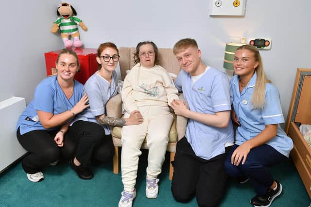 Jeanette with some staff in Glenbervie Care Home. Pic: Michael Gillen