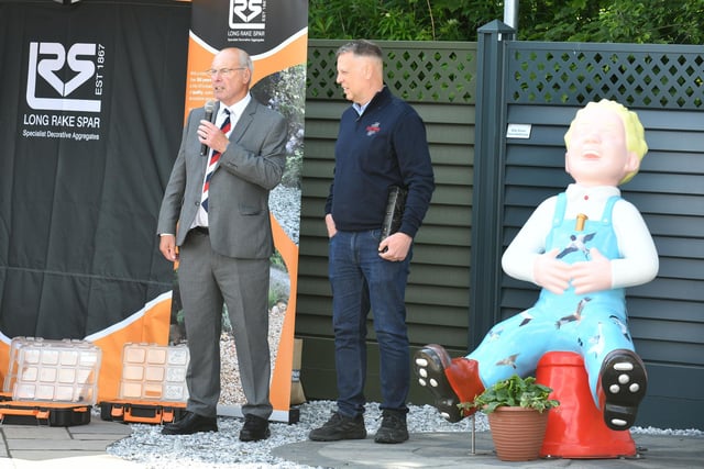 Alex Totten officially opens the event and the new premises.