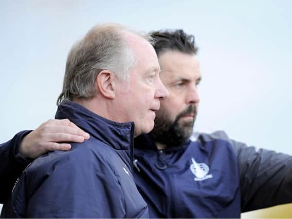 Paul Hartley was joined in the dugout by new assistant Jimmy Nicholl. Picture Michael Gillen