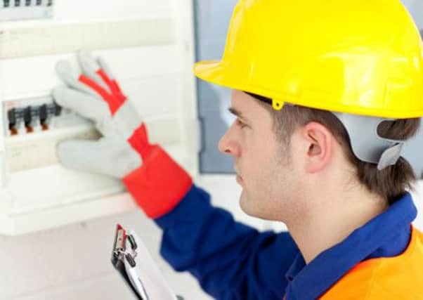 A Generic Photo of an electrician checking a fuse box See PA Feature HOMES Homes Column. Picture credit should read: PA Photo/thinkstockphotos. WARNING: This picture must only be used to accompany PA Feature HOMES Homes Column.