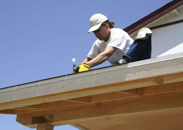 A Generic Photo of a man repairing his roof. See PA Feature HOMES Homes Column. Picture credit should read: PA Photo/thinkstockphotos. WARNING: This picture must only be used to accompany PA Feature HOMES Homes Column.