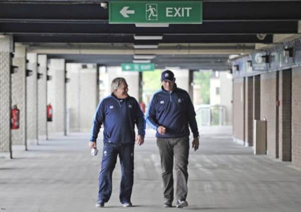 Scotland interim head coach Scott Johnson with his successor Vern Cotter. Picture: Phil Wilkinson