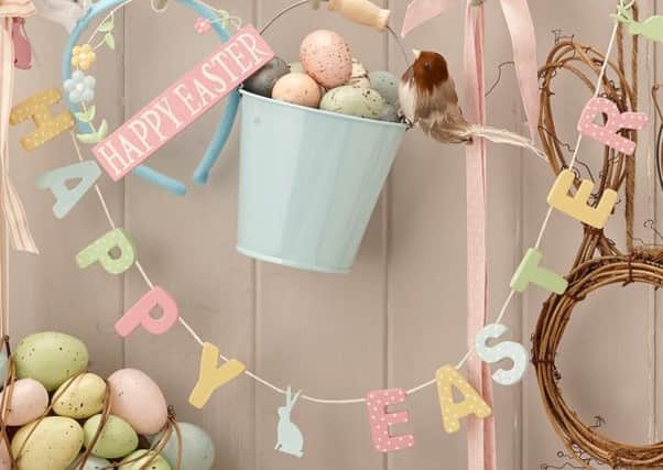 The Gisela Graham Wooden pastel Happy Easter garland, £9, The Contemporary Home.. Photo: PA Photo/Handout