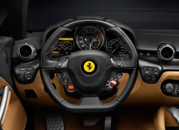 Inside the F12 is well-equipped although the wheel takes some getting used to.