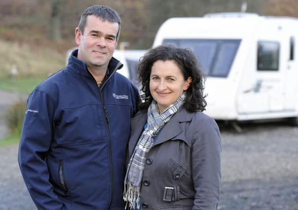 Grant and Gillian Turnbull at their award-winning caravan site at Carr's Hill, Denny. Picture: Michael Gillen
