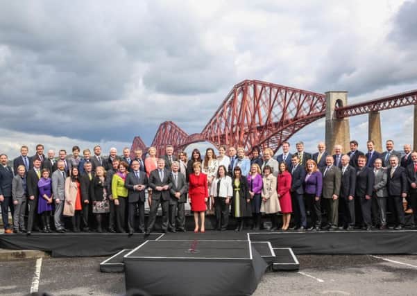 SNP leader Nicola Sturgeon in South Queensferry with the party's 56 MPs
Picture: Alistair Pryde
