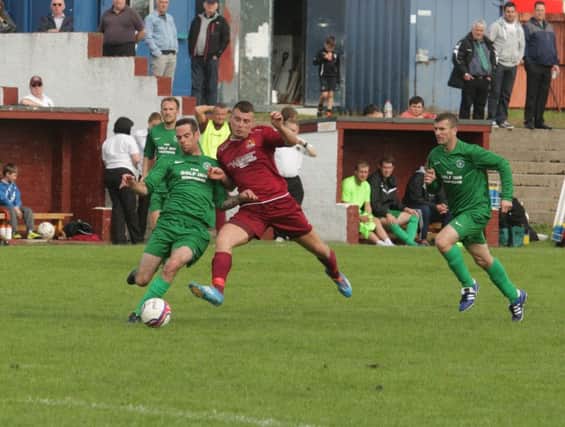 Motrose Roselea (in green) face a Scottish Cup cup derby against Forfar Albion