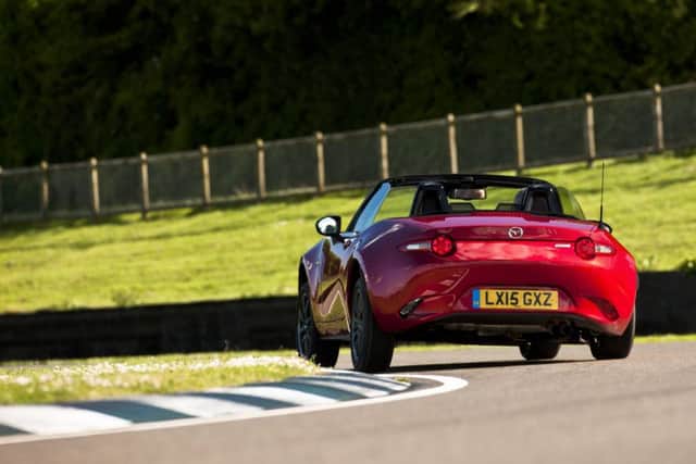 The back exterior of the 2015 Mazda MX-5. See PA Feature MOTORING Road Test. Picture credit should read: PA Photo/Handout. WARNING: This picture must only be used to accompany PA Feature MOTORING Road Test.