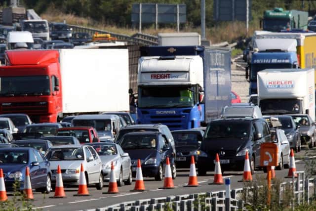 Traffic on the M25, on 26/08/15. See PA Feature MOTORING News. Picture credit should read: Steve Parsons/PA Photos. WARNING: This picture must only be used to accompany PA Feature MOTORING News