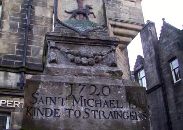 The St Michael's Well in Linlithgow which declares the town's 'kinde to straingers' motto