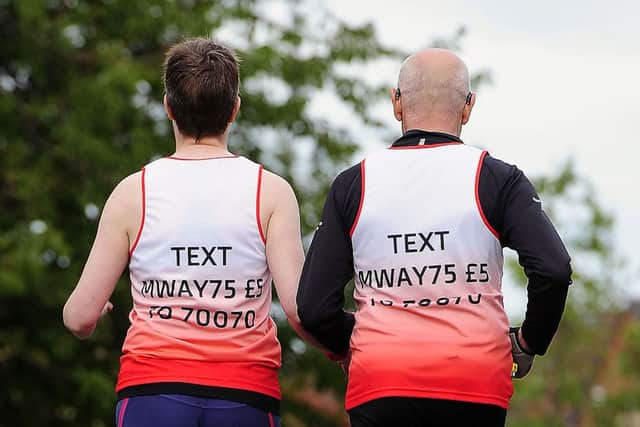 Michael and Fiona run together in training for triathlon