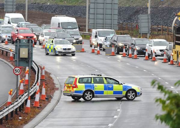 The approach to the Forth Road Bridge closed off to all traffic and pedestrians as a precaution to allow a controlled explosion to take place near the bridge. Picture Ian Rutherford