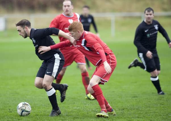 Action from Saturday's clash between Dunipace and Wishaw