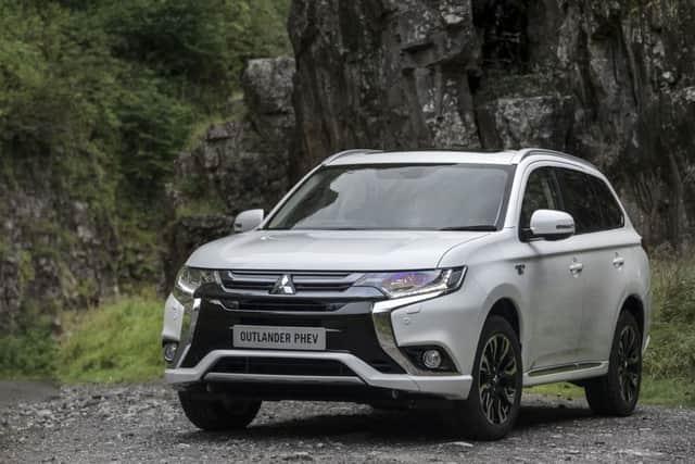 The front exterior of the 2015 Mitsubishi Outlander PHEV.