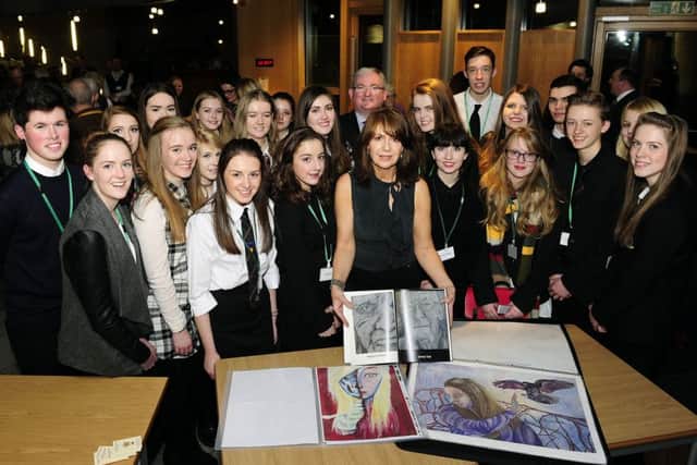 Anne Power, MSP Angus MacDonald and some of the pupils whose work was also on display