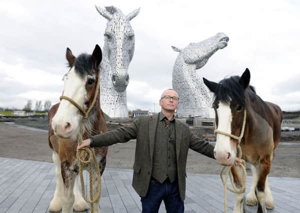 Kelpies creator Andy Scott with Clydesdale horses Duke and Baron