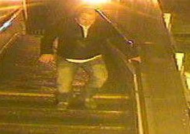 Transport police want to trace this man in connection with an assault on a woman in December