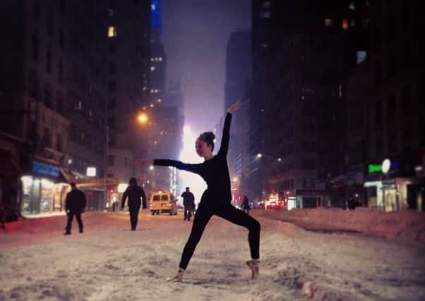 Aimee Miller (13) of Falkirk, striking a ballet pose in 7th Avenue, New York during Storm Jonas