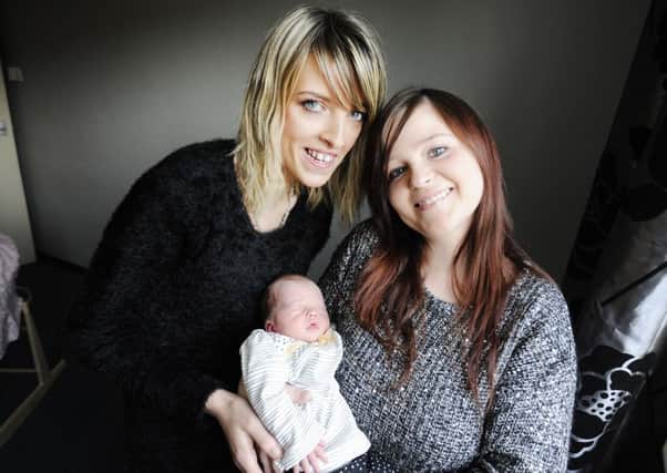 New mum Emma Thomson, right, with baby Kaira McEwan and friend Laura Snedden who helped with her delivery