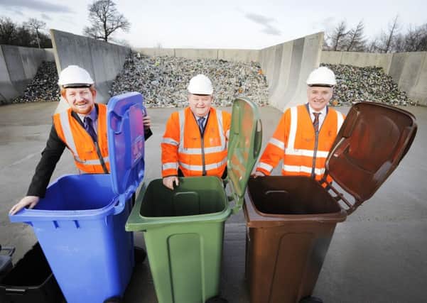Councillor Craig R Martin, Falkirk Council Craig Martin and Environment Secretary Richard Lochhead at Roughmute Recycling Centre. Picture: Alan Murray