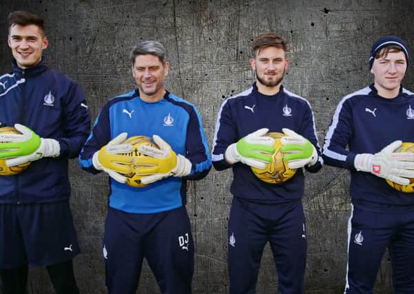 Picture Gordon Whyte. Derek Jackson's goalkeeping gloves are worn by Alex Tokarczyk, Danny Rogers and Lewis McMinn.