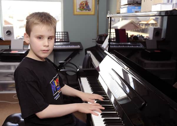 Young blind pianist Ethan Loch (Picture Michael Gillen).