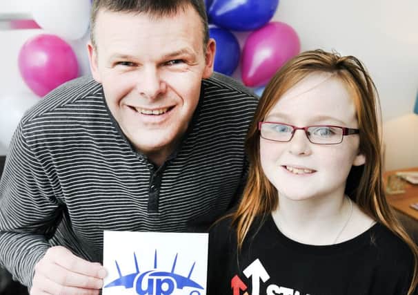 Louise and her dad David will scale the London O2 arena