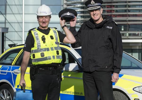 BT Openreach engineering manager Ricky Drummond and Police Scotland Chief Constable Phil Gormley. (Picture by Ian Jacobs.)