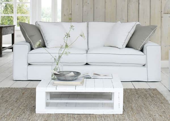 The French Connection Slate sofa, in white combination, exclusively available at DFS. Photo: PA Photo/Handout