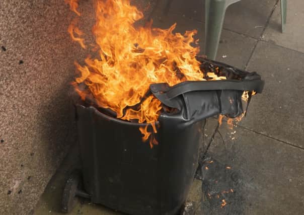 Metal bins may be one way to stop refuse fires happening