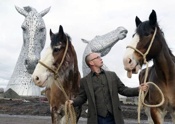 Sculptor Andy Scott, pictured here with Clydesdale horses Duke and Baron, holds the intellectual property rights to the Kelpies. Picture: Michael Gillen
