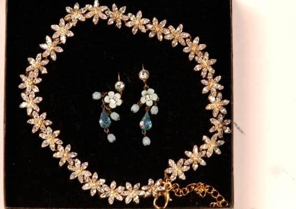 Jewellery was stolen from two homes in Falkirk. Police think the incidents could be connected