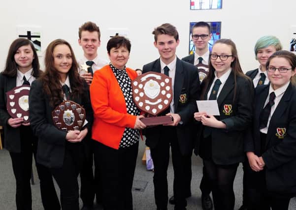 Winners and highly commended from the annual St Mungo's High School PTA Music Festive with Linda Muir from Denny High School presenting the prizes.
Picture: Michael Gillen