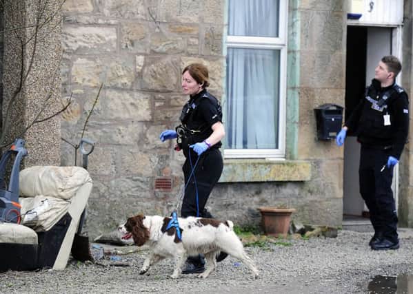 Police Scotlandsearching properties
