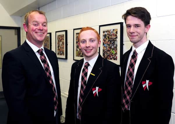 Head teacher Iain Livingstone with 2016 Dux Andrew Hyslop and Adam Smith. Picture: Michael Gillen
