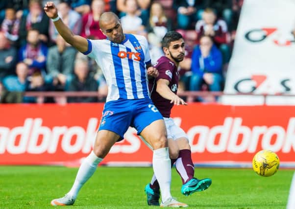 Josh Magennis, left, made the complaint to police after the Hearts v Kilmarnock match in February
