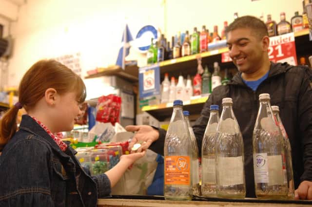 The idea of returning used bottles to be used again used to be a money-spinner for kids