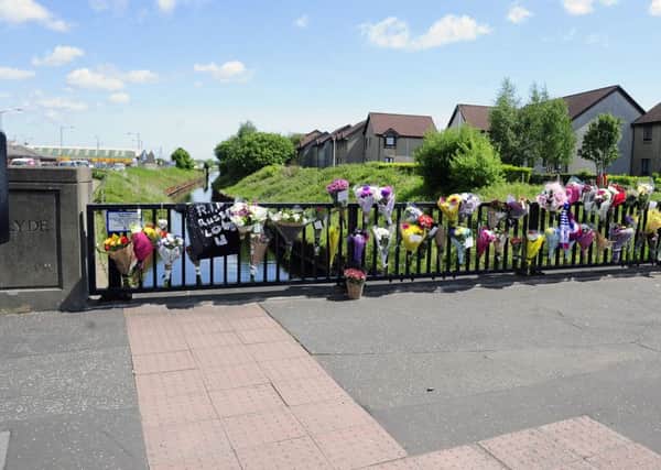 Family and friends have left tributes to Russell Robertson at Bainsford Bridge