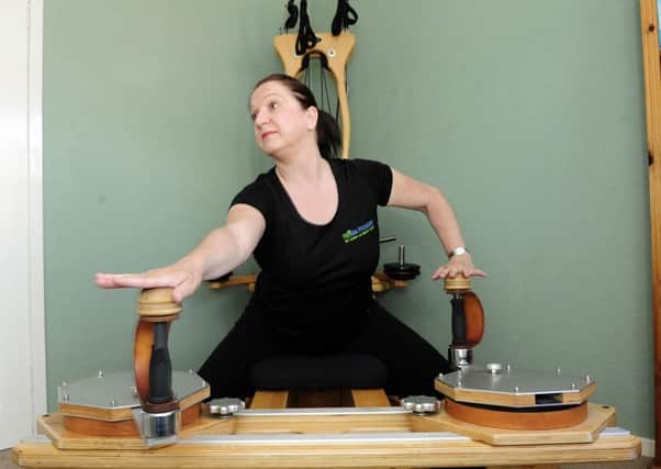 Sandie Wilson uses the Gyrotonic Expansion equipment